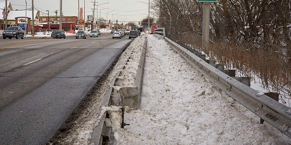 Snow on an arterial road in the Chicago region.