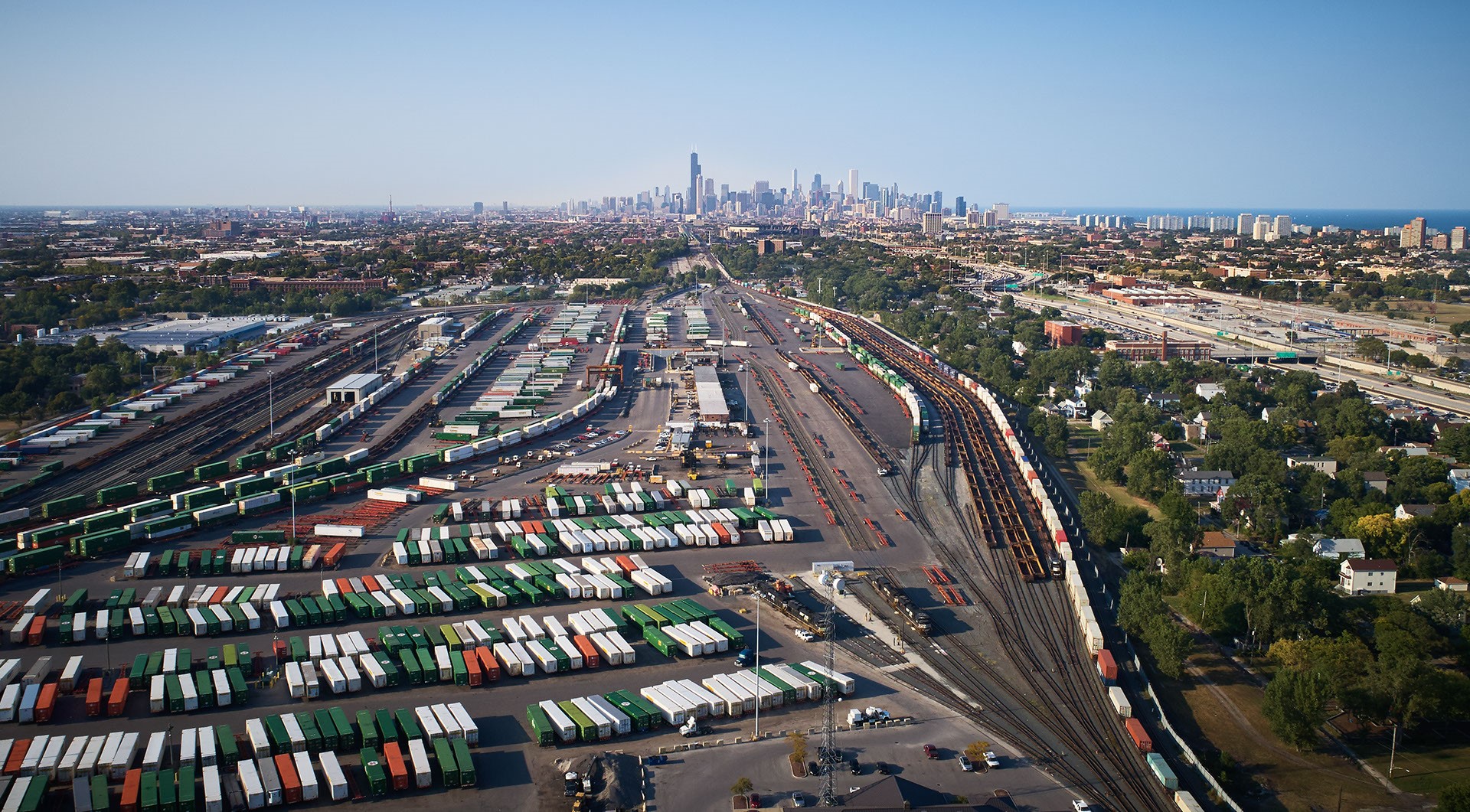 Railyard with boxcars. Chicago skyline in background